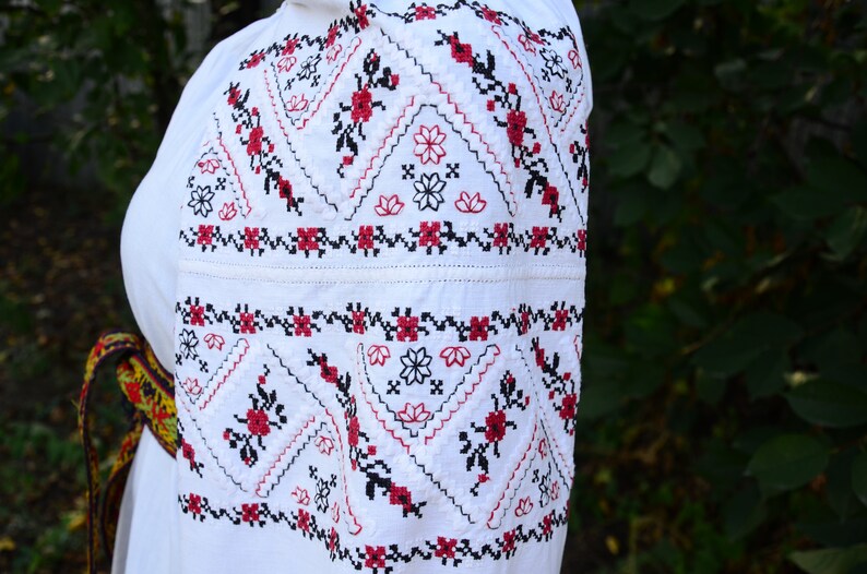 Vintage fashion Old Ukrainian dress Boho style Folk short shirt Geometry and floral pattern Beautiful embroidery Antique woman clothing