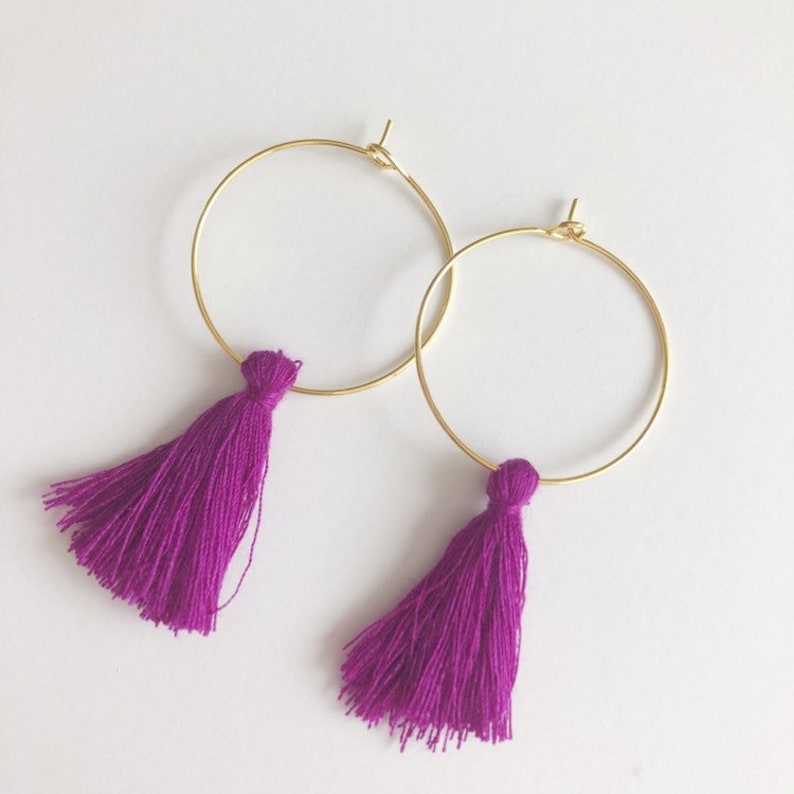 Gold and purple tassel statement hoop earrings