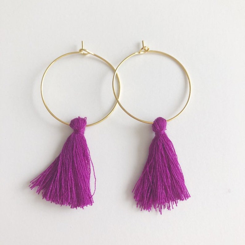 Gold and purple tassel statement hoop earrings