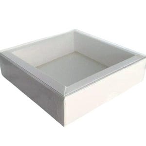 Pudełko ze ściankami o średnicy 4,7"x4,7"x1,18" z białym tekturowym dnem i wierzchem z octanu