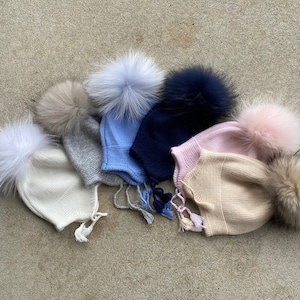 Gorro con pompón de piel de mapache para bebé de cachemira con orejeras