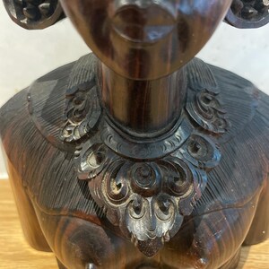 Hand carved  Wood detailed sculpture from Bali of a traditional Indonesian woman,   Bali Indonesia