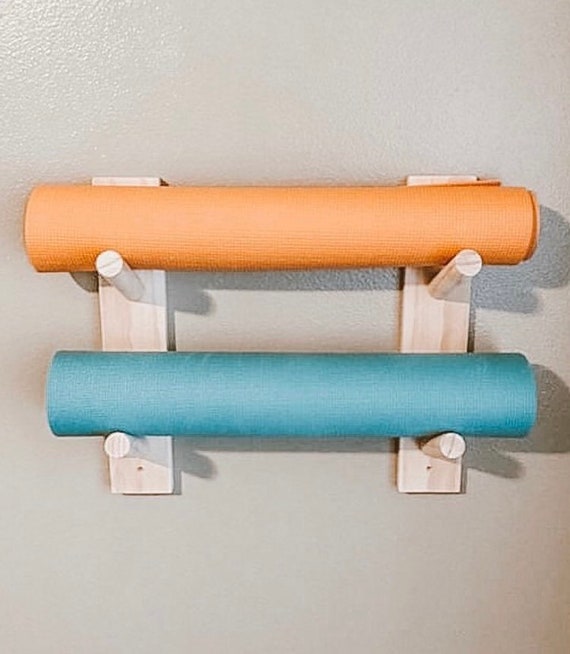 wall mounted yoga mat holder