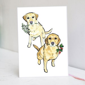 Tarjeta navideña con labradores amarillos