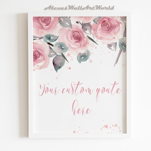 May include: A white framed print with a watercolor design of pink roses and green leaves. The background is white with pink watercolor splatters. The text "Your custom quote here" is written in pink script.