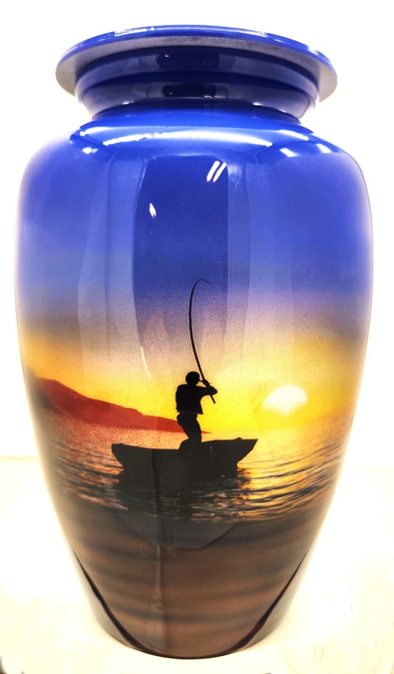 Titled Last Cast Unique Fishing theme urn Beautiful urn of a fisherman at  dusk making his final cast A fitting farewell Ships from USA