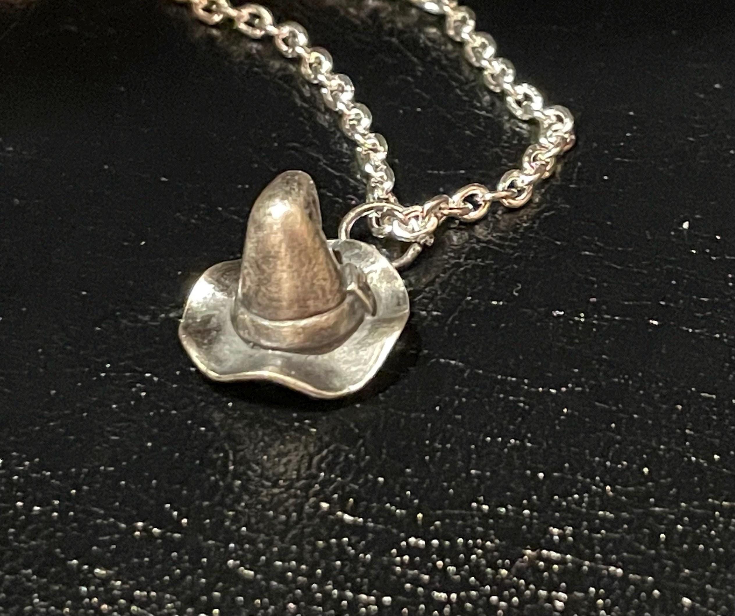 Sterling Silver witches hat pendant.