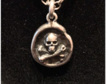 The Pirates Seal. Handmade skull and crossbones silver pendant.