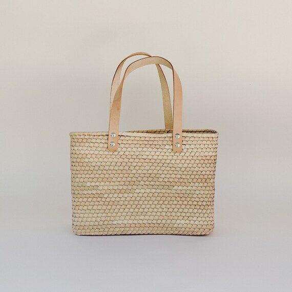 straw tote with leather handles