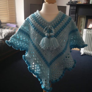 Kids Poncho in Turquoise Tones has wide curly hem and tassel ties for age 2 to 5 years, unique attractive gift for a child image 2