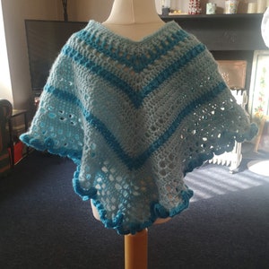 Kids Poncho in Turquoise Tones has wide curly hem and tassel ties for age 2 to 5 years, unique attractive gift for a child image 3