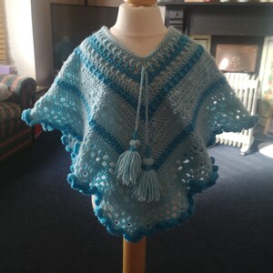 Kids Poncho in Turquoise Tones has wide curly hem and tassel ties for age 2 to 5 years, unique attractive gift for a child image 10
