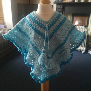 Kids Poncho in Turquoise Tones has wide curly hem and tassel ties for age 2 to 5 years, unique attractive gift for a child image 9