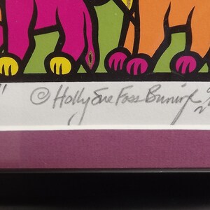 May include: A colorful print of a group of animals, including a lion, a bear, and a giraffe. The print is signed "Rainbow" and "Holly Sue Foss Bunnik 9/300".