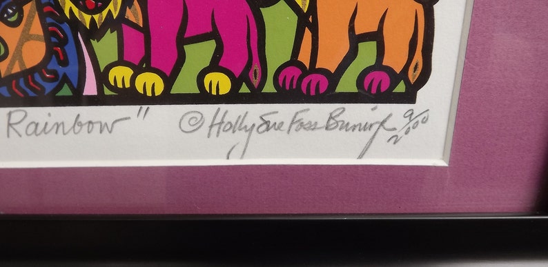 May include: A colorful print of a group of animals, including a lion, a bear, and a giraffe. The print is signed "Rainbow" and "Holly Sue Foss Bunnik 9/300".