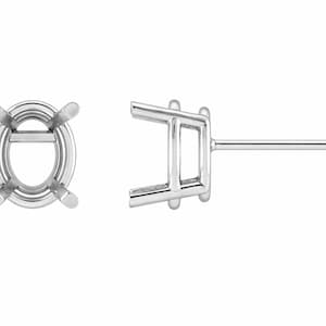 Pendientes ovalados de oro de 14 quilates. Montura: Engaste de cuatro puntas (par).