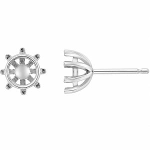 May include: A pair of silver-toned stud earring settings featuring a circular base with eight prongs extending outward to hold a gemstone. The side view shows the curved metal structure and the straight post designed for insertion into an earlobe.