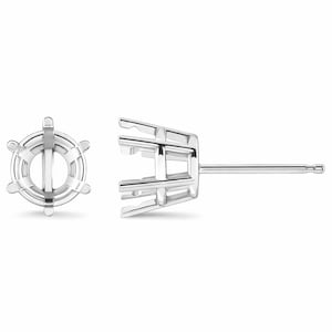 May include: Two silver-colored stud earring settings. One setting is a complete circle with six prongs. The other setting is a partial view of the same design, showing the post and the four prongs that will hold a gemstone.