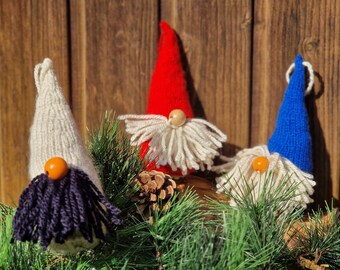 Colorful gnomes in different colors - blue, yellow, red, beige