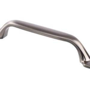 May include: A brushed nickel cabinet pull with a curved design and square ends. The pull has two small holes for mounting.
