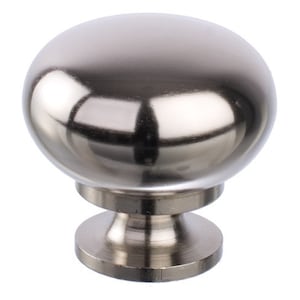 May include: A round, silver cabinet knob with a smooth, shiny finish. The knob has a small, round base.