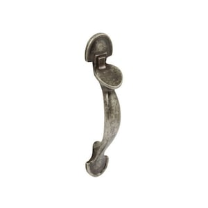 May include: A silver-toned door handle with a curved design and a decorative latch. The handle has a textured finish.