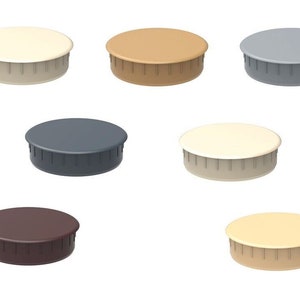 May include: Assortment of round plastic furniture caps in various colours, including beige, brown, grey, and dark brown. The caps are designed to protect furniture legs from scratches and damage.