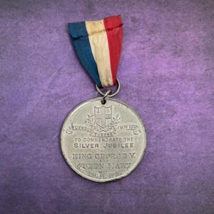 King George V and Queen Mary Silver Jubilee medal.