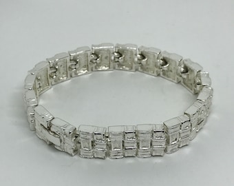 NAPIER silver tone link bracelet.