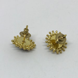 Vintage starburst screw back earrings. | Etsy
