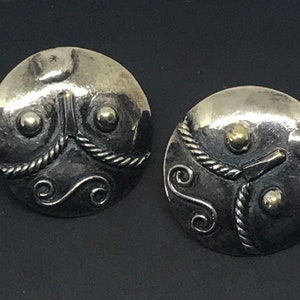 1980s silver tone large ear studs.
