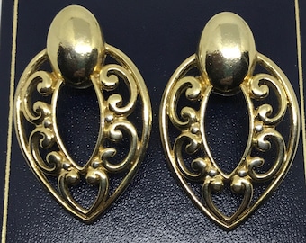 1980s gold tone clip earrings.