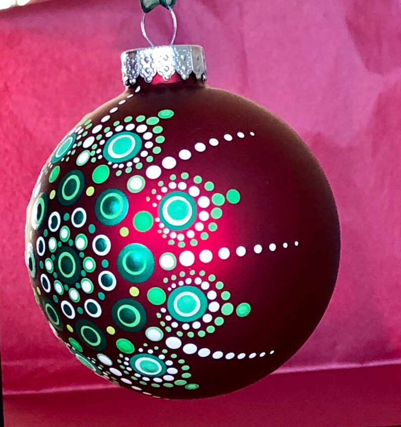 Striking snowflake dot Mandala on red glass ball ornament | Etsy