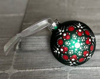 Hand painted dot Mandala on 2.6” matte green glass ball ornament with satin ribbon