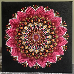 Vibrant dot Mandala on black stretched canvas 10&quot; x 10&quot; in shades of pink with white & gold accents