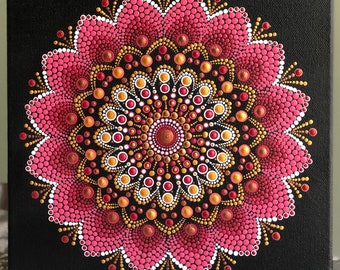 Vibrant dot Mandala on black stretched canvas 10" x 10" in shades of pink with white & gold accents