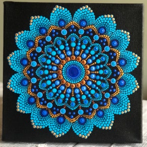 Vibrant dot Mandala on black stretched canvas 8&quot; x 8&quot; in shades of blue & turquoise with gold accents