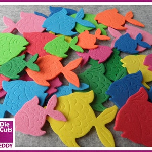 May include: A collection of colorful felt fish shapes in various colors, including red, blue, green, yellow, orange, and pink. The fish are all the same size and shape, and they are arranged in a random pattern.