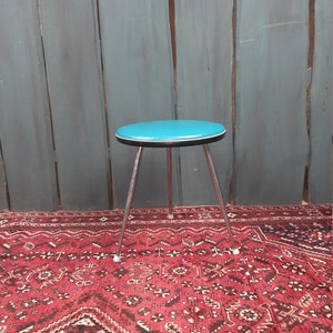 midcentury three-legged stool skai cover blue chrome 50s German stool