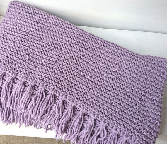 LIVING SIMPLESIZE Knitted blanket in purple
