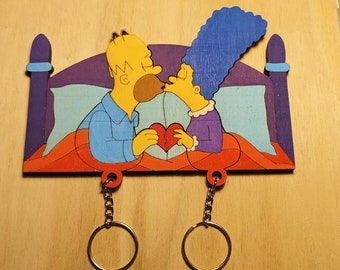 Colgador de llaves con llavero del personaje de Los Simpson