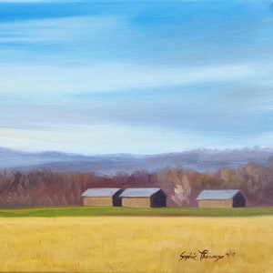 May include: A painting of a rural landscape with a black barn in the foreground and three smaller barns in the distance. The sky is a light blue with white clouds. The field in the foreground is a golden yellow.