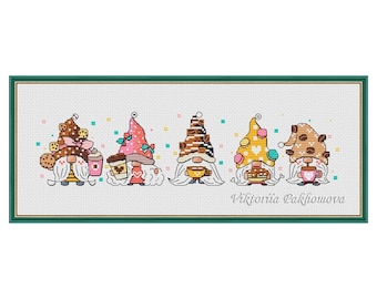 May include: Cross-stitch art featuring five whimsical gnomes, each with a unique hat and holding coffee-themed items. The gnomes are in a green framed rectangular design. The artist's name, Viktoriia Pakhomova, is at the bottom.