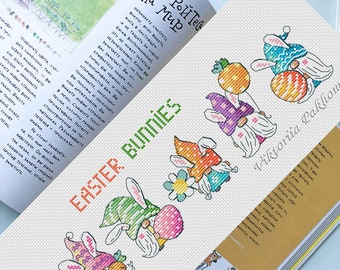 May include: Cross stitch pattern featuring five Easter bunnies dressed as gnomes. The bunnies are wearing colorful hats and holding carrots and Easter eggs. The pattern is titled "Easter Bunnies".