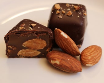 Roasted Almond; Handcrafted, gourmet caramel in dark chocolate