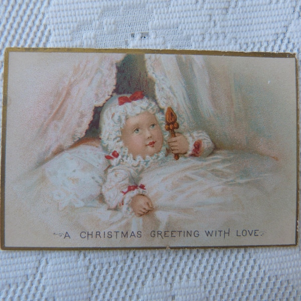 Small unused Victorian Christmas card/A Christmas wish with love/Baby rattle chromo cradle/Late 1800 rare antique