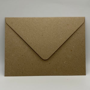 May include: A brown paper envelope with a flap.