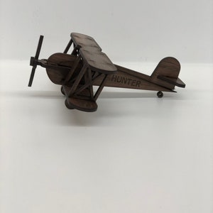 Wooden toy airplane with working prop! Custom text engraved wooden plane