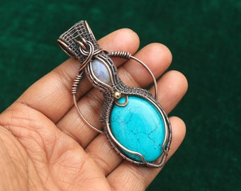 邪眼の眠れる森の美女ターコイズペンダント 銅線で包まれたムーン