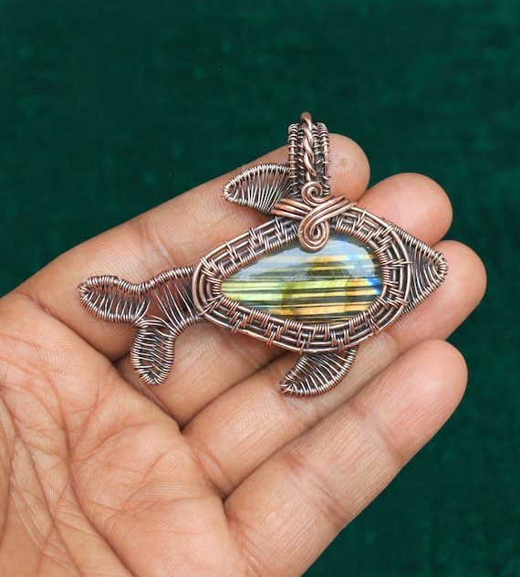 Fish design pendant deals